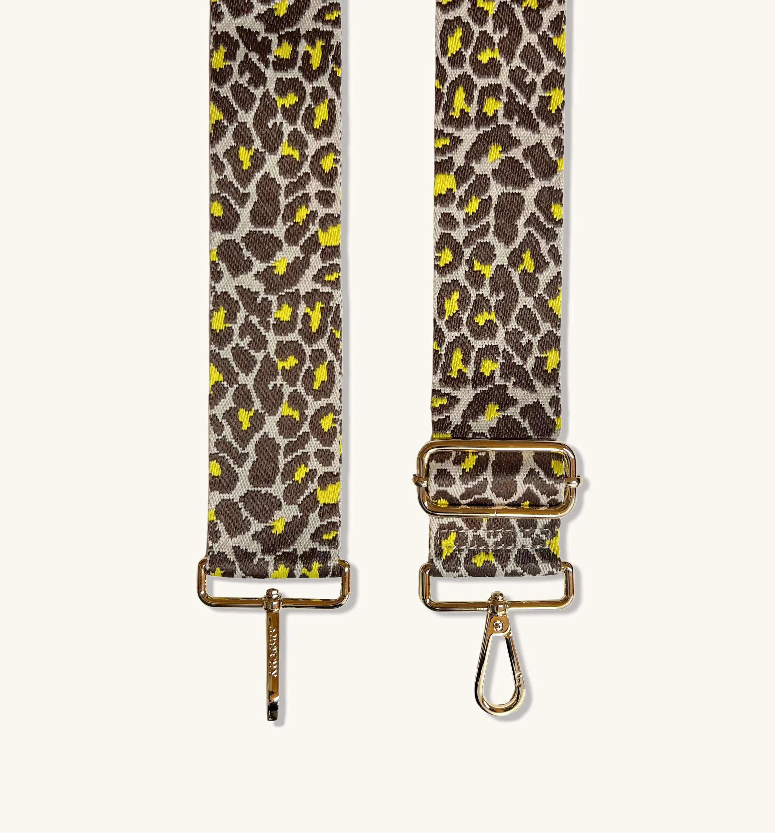 The Tassel Light Grey Leather Crossbody Bag With Lemon Cheetah Strap